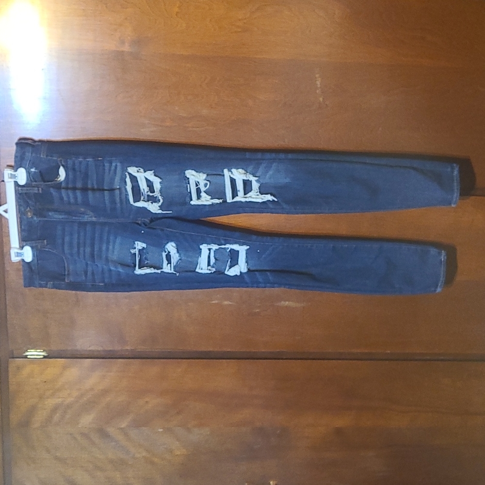 4 pair of American eagle jeans